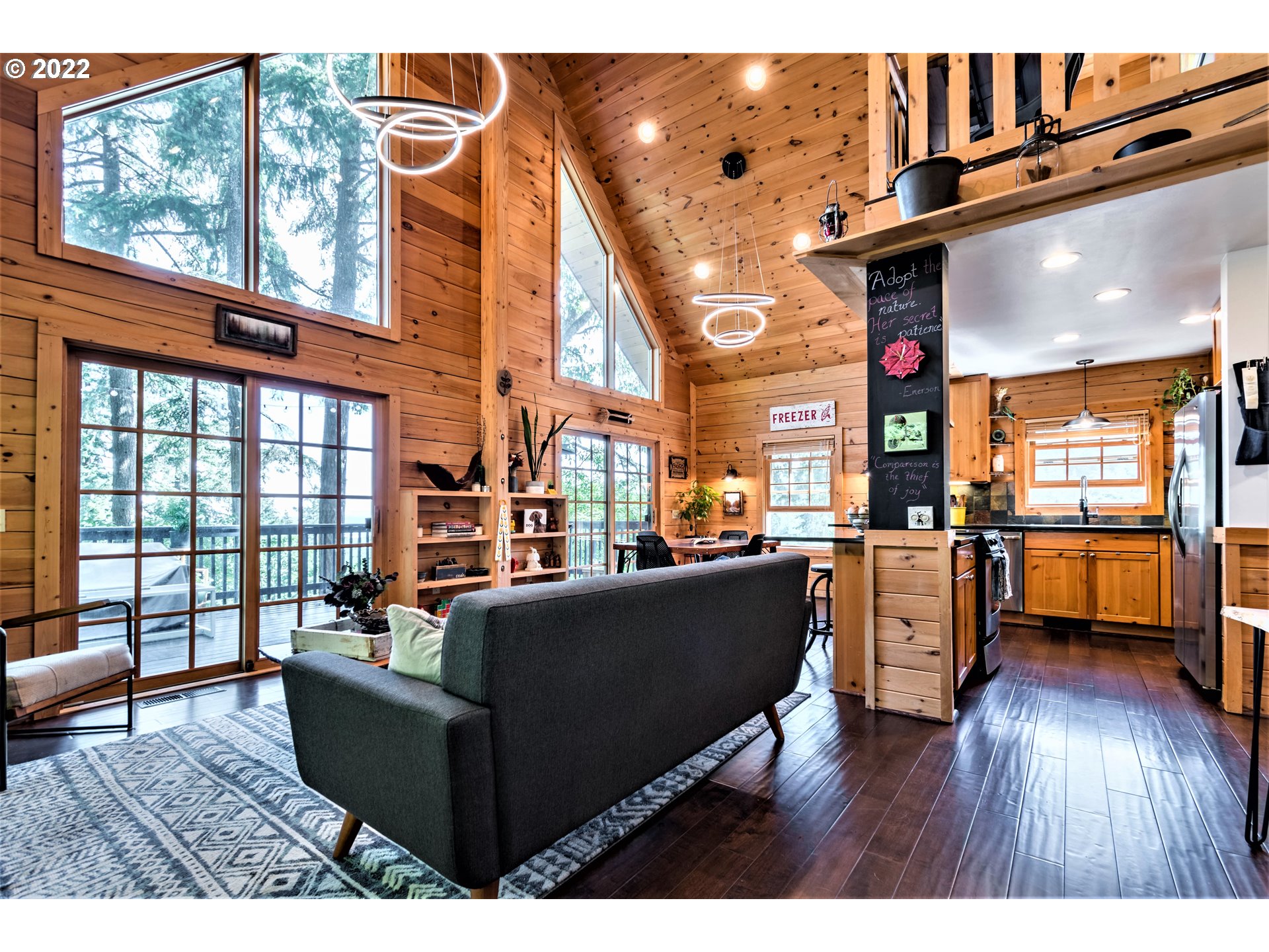 3330 Videra Drive Eugene, OR 97405 - Photo 4 of 32 a living room with furniture window and wooden floor
