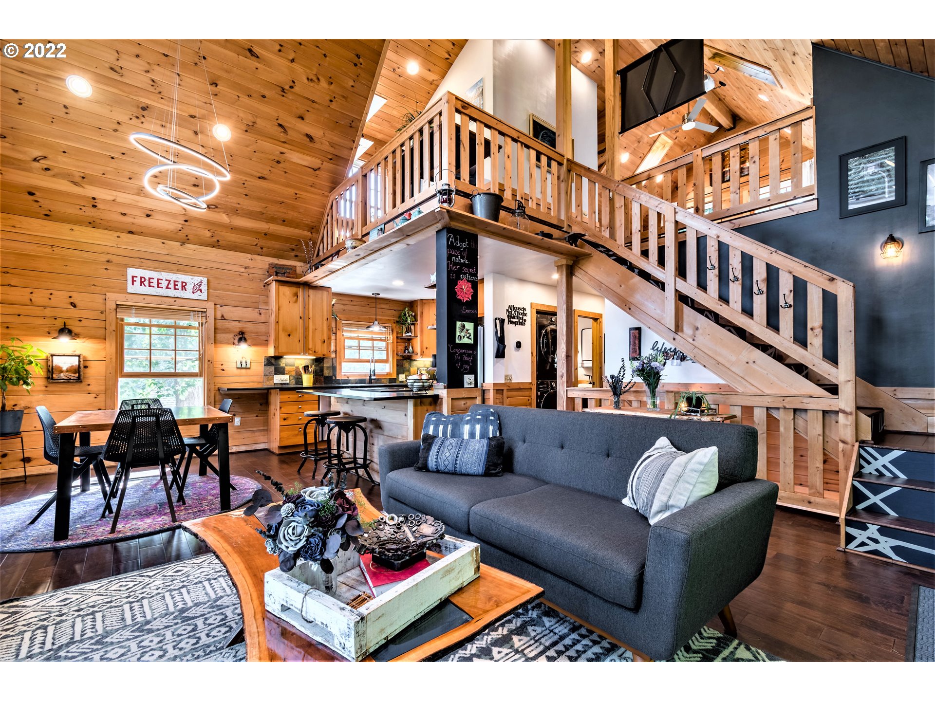 3330 Videra Drive Eugene, OR 97405 - Photo 5 of 32 a living room with furniture a rug and a table