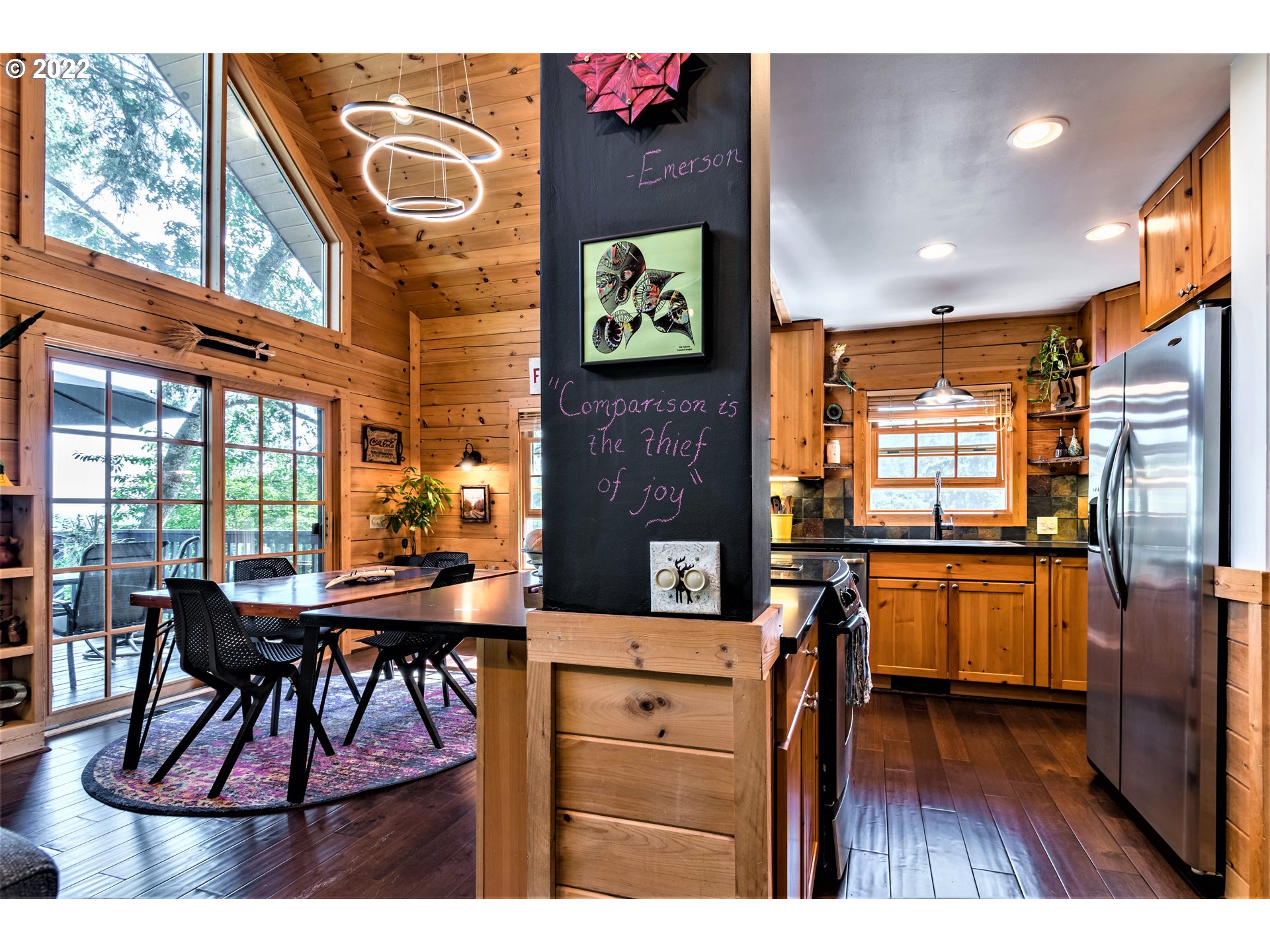 3330 Videra Drive Eugene, OR 97405 - Photo 6 of 32 a view of a dining room with furniture and window