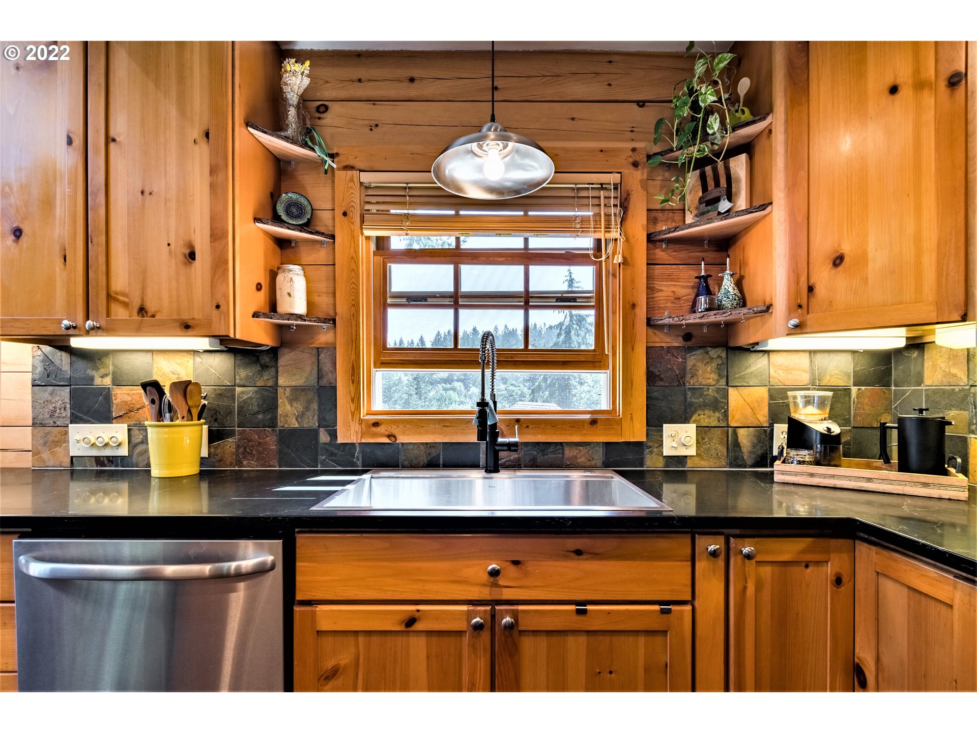 3330 Videra Drive Eugene, OR 97405 - Photo 9 of 32 a kitchen with a sink and cabinets