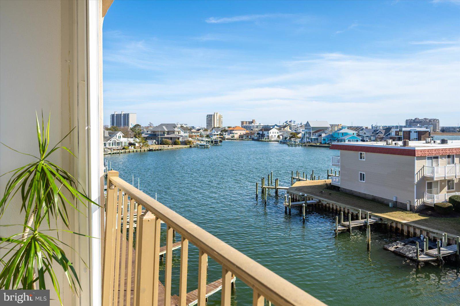 609 Dory Road, Unit 304 Ocean City, MD 21842 - Photo 42 of 55 a view of a lake with a terrace
