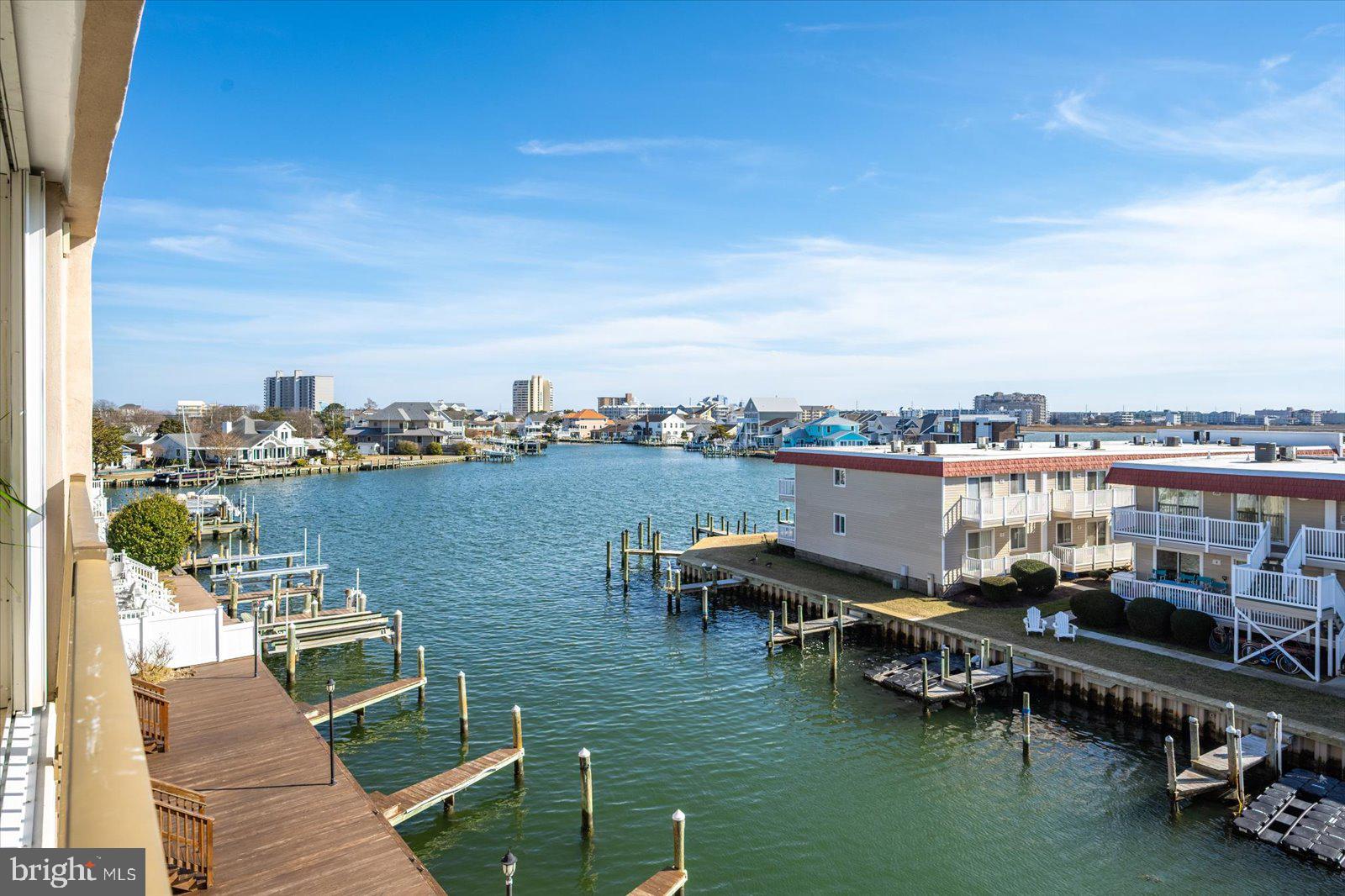 609 Dory Road, Unit 304 Ocean City, MD 21842 - Photo 50 of 55 a view of a lake with a mountain view