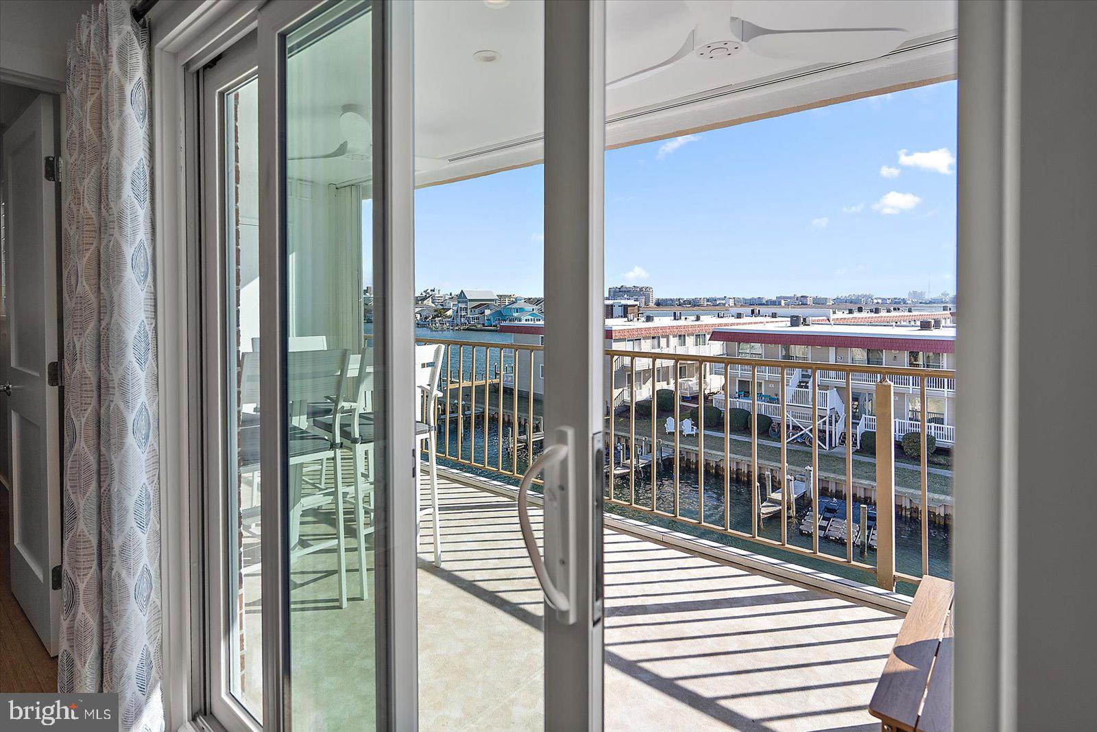 609 Dory Road, Unit 304 Ocean City, MD 21842 - Photo 10 of 55 a view of a balcony from door