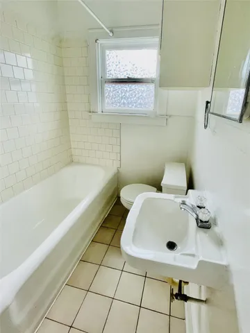 a bathroom with a sink and a bathtub