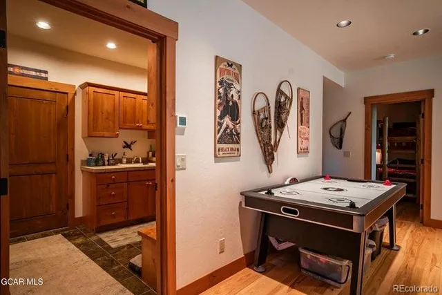 a view of workspace with wooden floor
