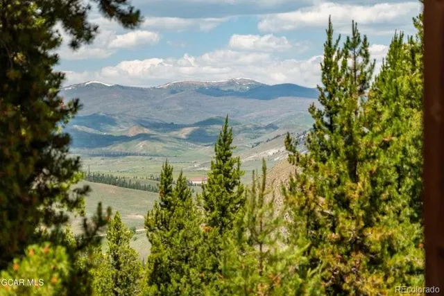 a view of a lake with a building in front of it
