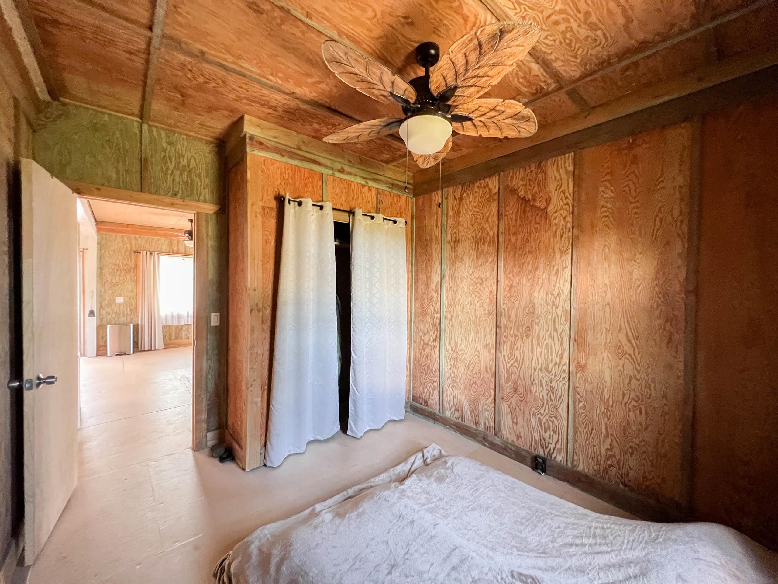 2594 Puuomalei Road Haiku, HI 96708 - Photo 11 of 30 a view of a hallway with a chandelier