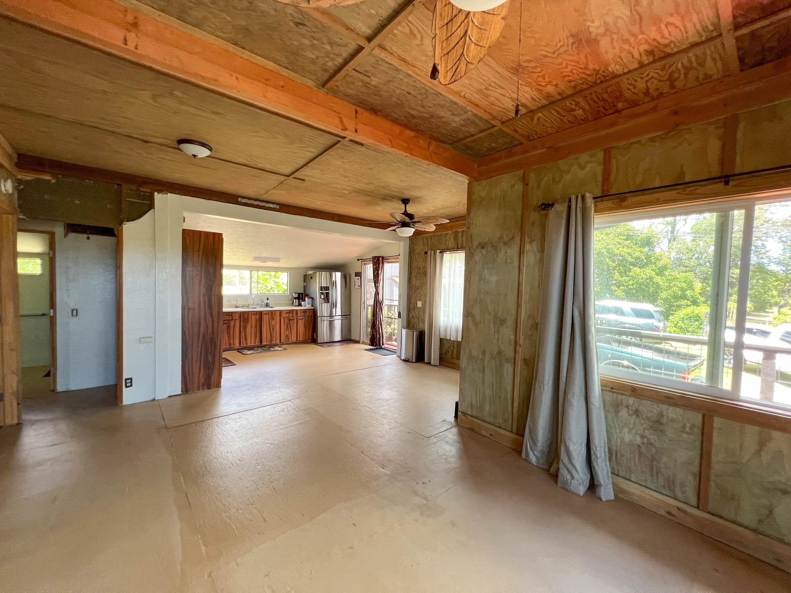 2594 Puuomalei Road Haiku, HI 96708 - Photo 13 of 30 a view of a hallway with furniture and a window