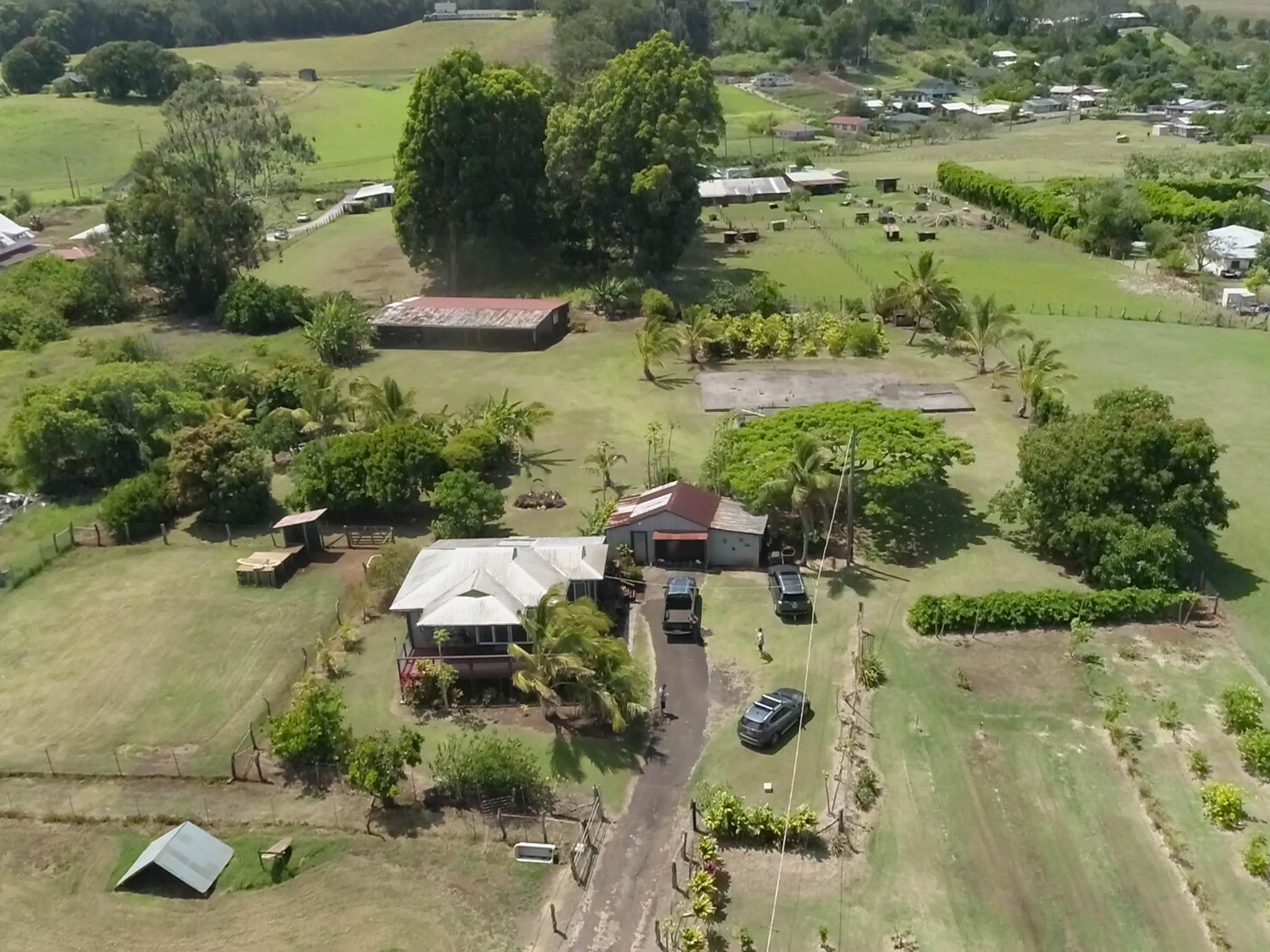 2594 Puuomalei Road Haiku, HI 96708 - Photo 3 of 30 an aerial view of multiple houses with yard