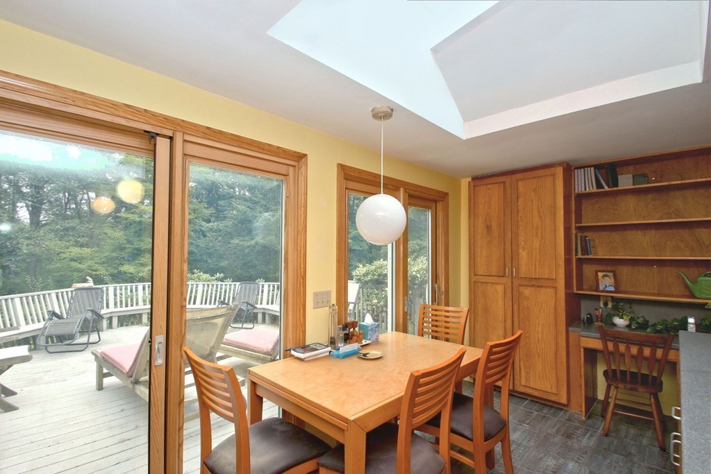 62 Maynard Road Sudbury, MA 01776 - Photo 7 of 30 a view of a dining room with furniture window and wooden floor