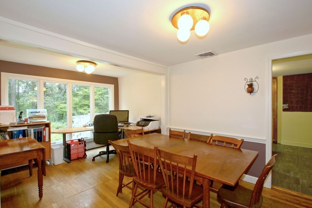 62 Maynard Road Sudbury, MA 01776 - Photo 8 of 30 a view of a dining room with furniture window and outside view