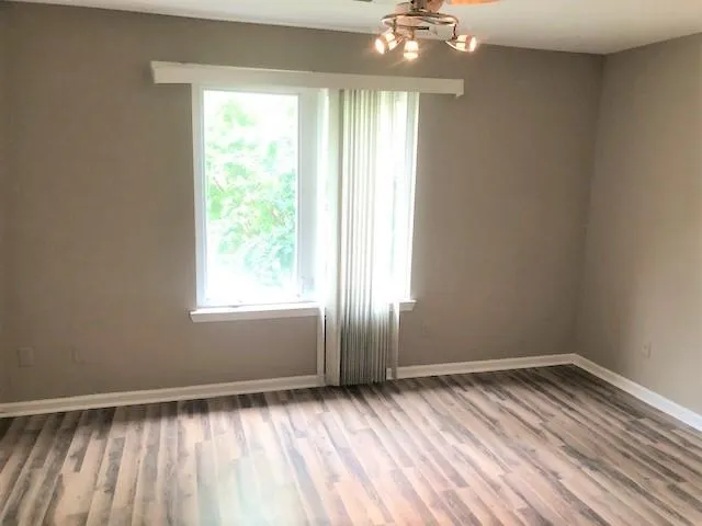 a view of an empty room and window