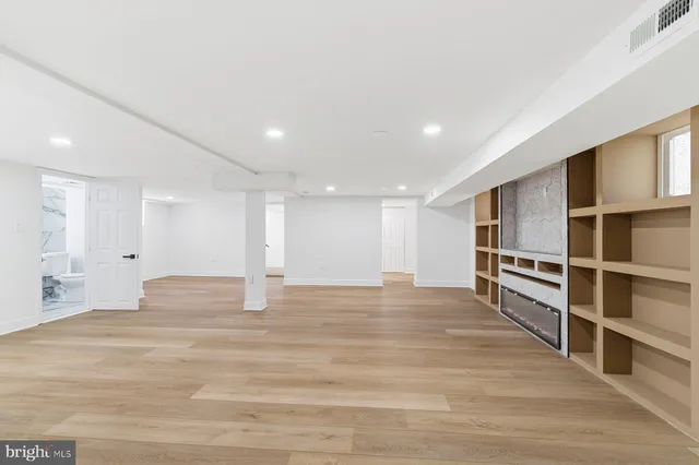a view of kitchen and wooden floor