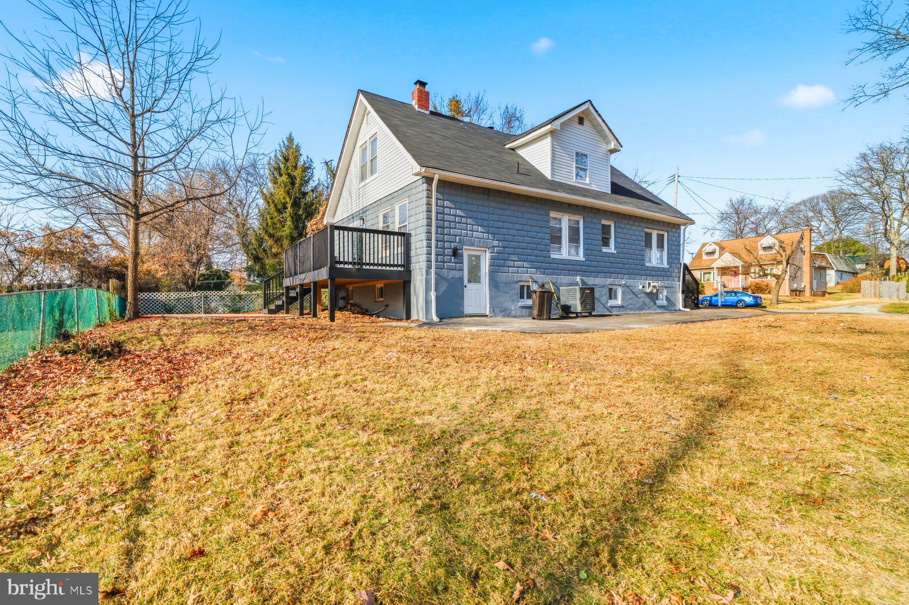 413 1st Avenue Halethorpe, MD 21227 - Photo 33 of 38 a front view of house with yard