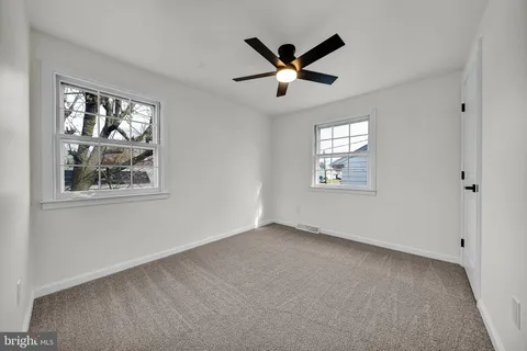 a room with a bed and a television in it