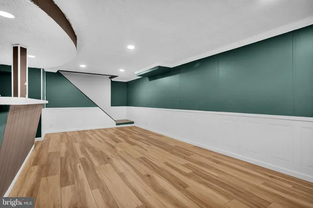 a room with a bed and a television in it