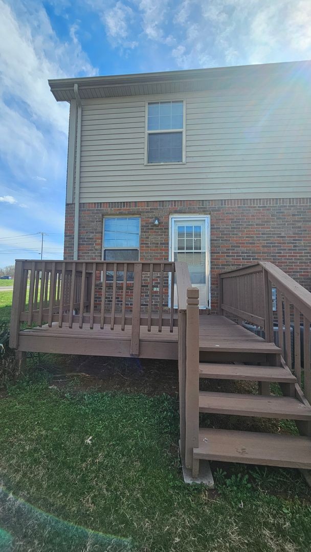 2451 Wilson Road, Unit 6 Clarksville, TN 37043 - Photo 12 of 14 a view of a house with a yard