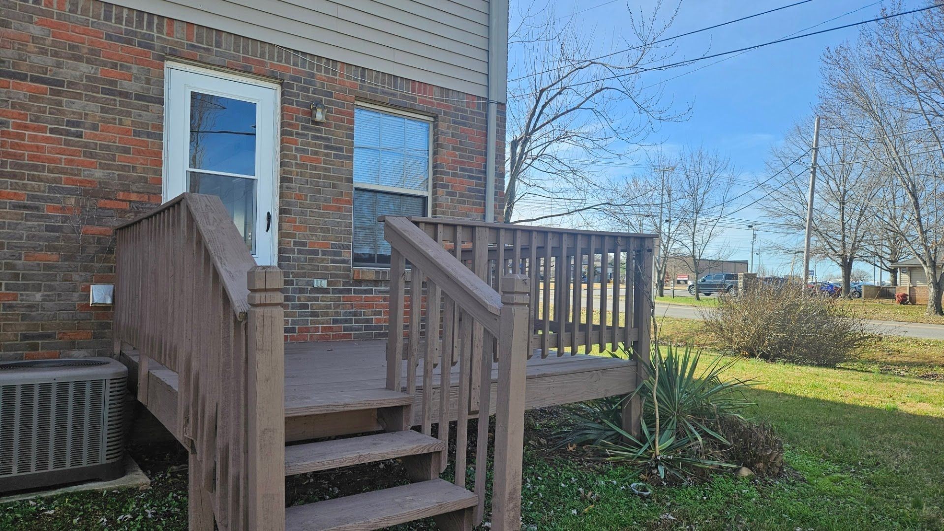 2451 Wilson Road, Unit 6 Clarksville, TN 37043 - Photo 2 of 14 a view of backyard with wooden fence and large trees