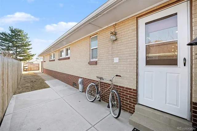 a view of a car garage with furniture