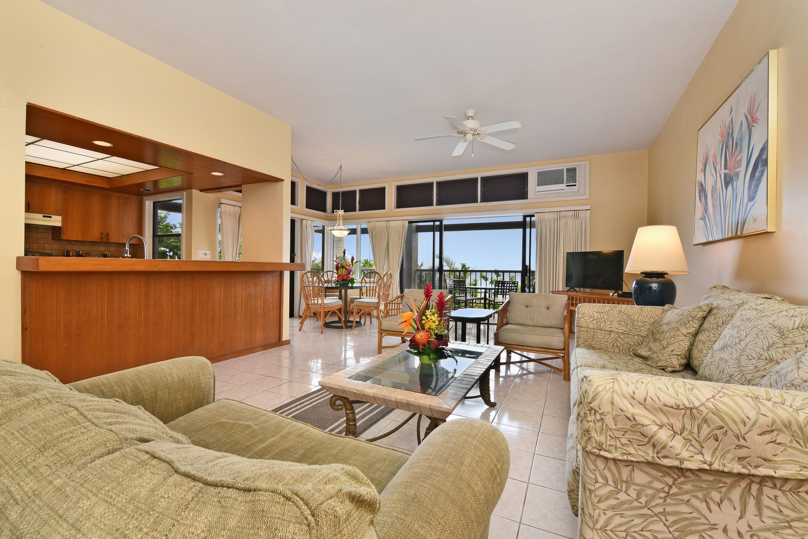100 Ridge Road, Unit 161113 Lahaina, HI 96761 - Photo 20 of 30 a living room with furniture and a wooden floor