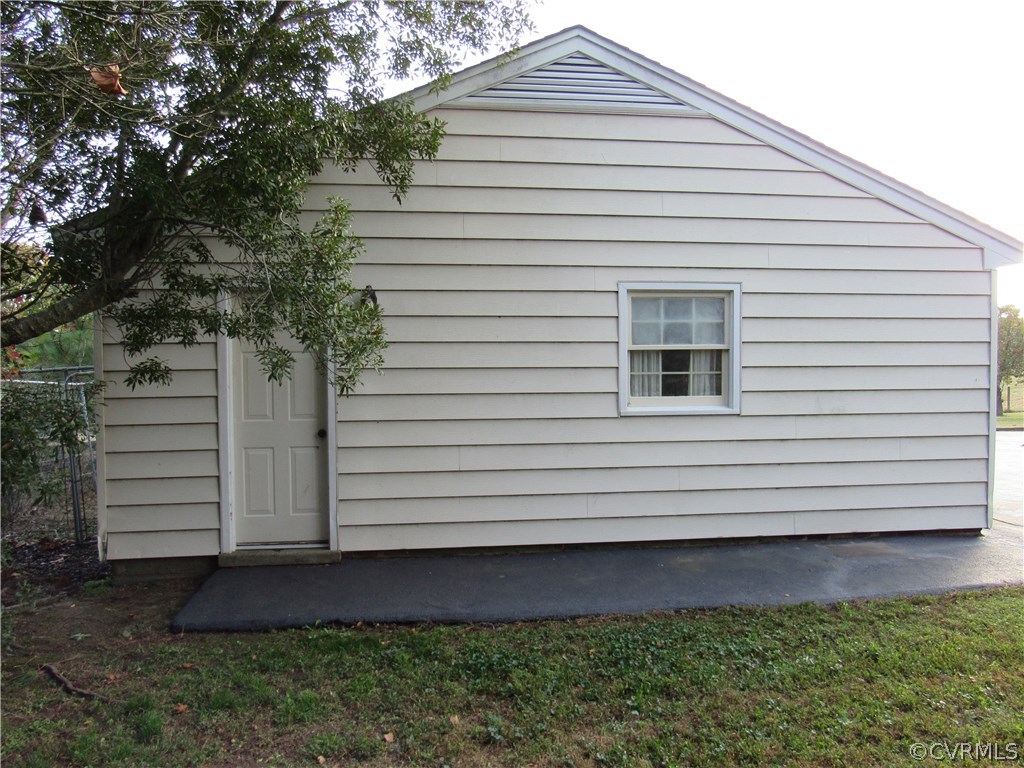 13449 Ashland Road Ashland, VA 23005 - Photo 39 of 50 Garage has a pedestrian door, dog kennel behind ga