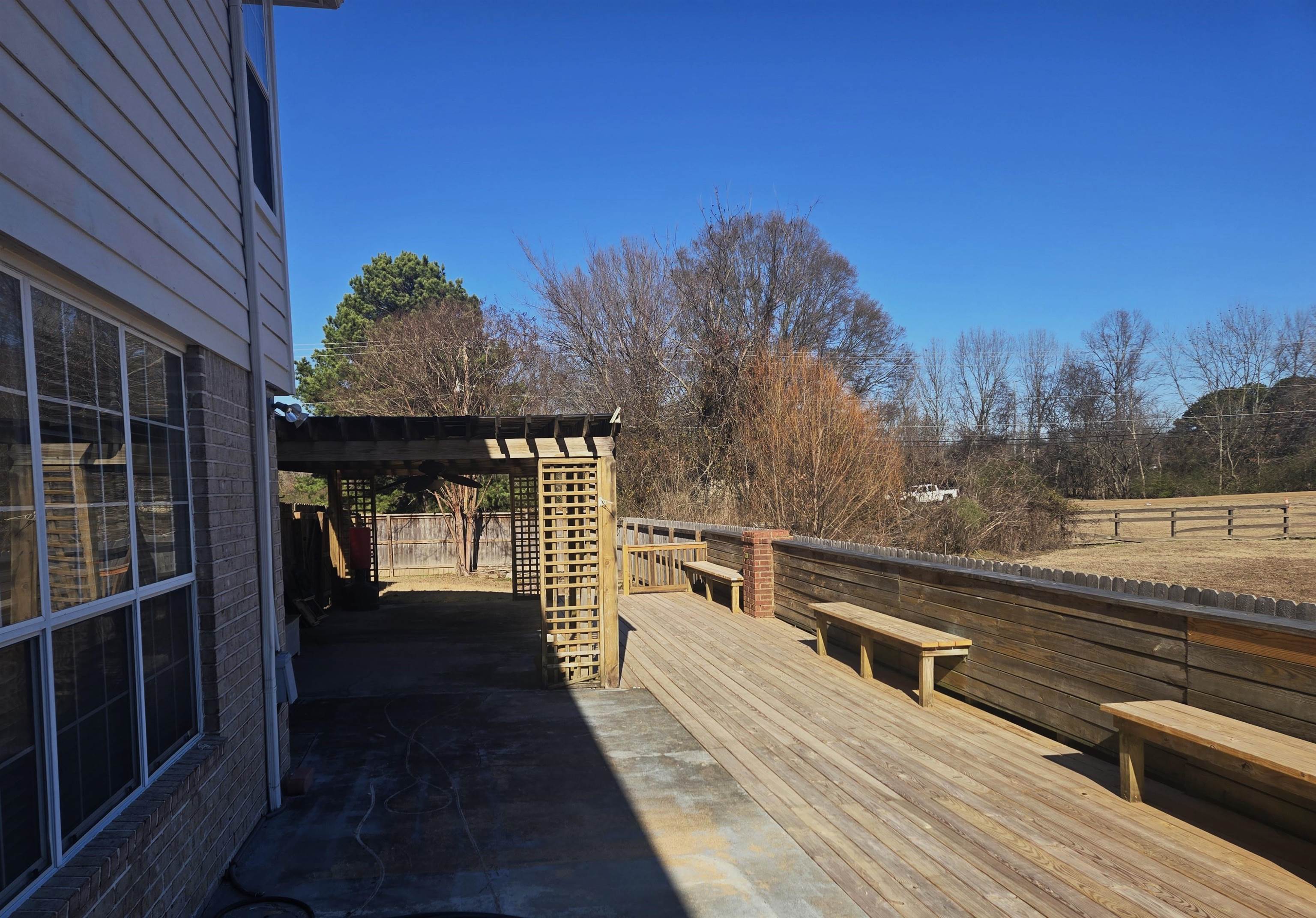 10448 Sunnybrook Circle Collierville, TN 38017 - Photo 14 of 22 a view of a balcony with wooden floor and outdoor space