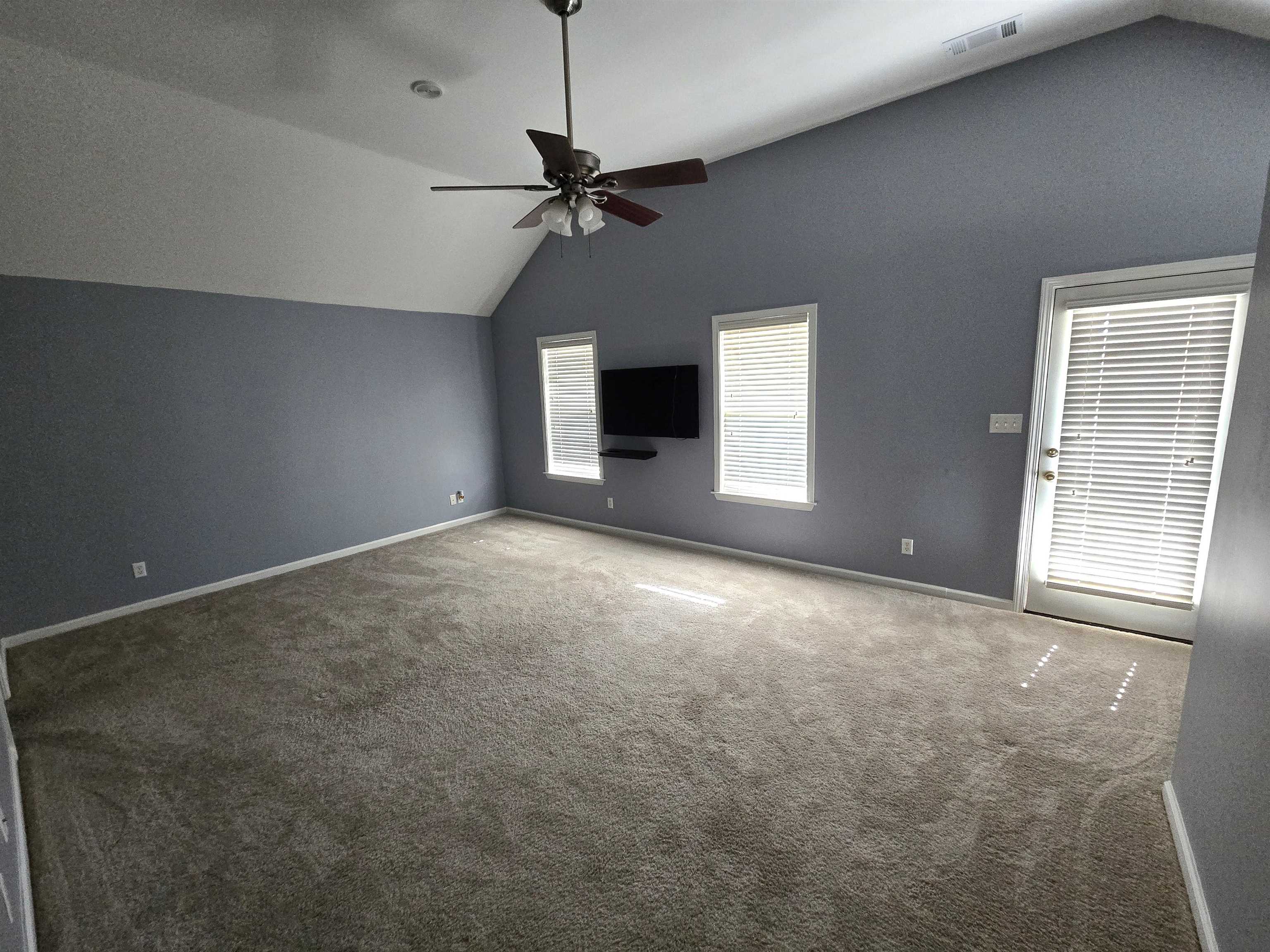 10448 Sunnybrook Circle Collierville, TN 38017 - Photo 8 of 22 an empty room with a empty space and windows