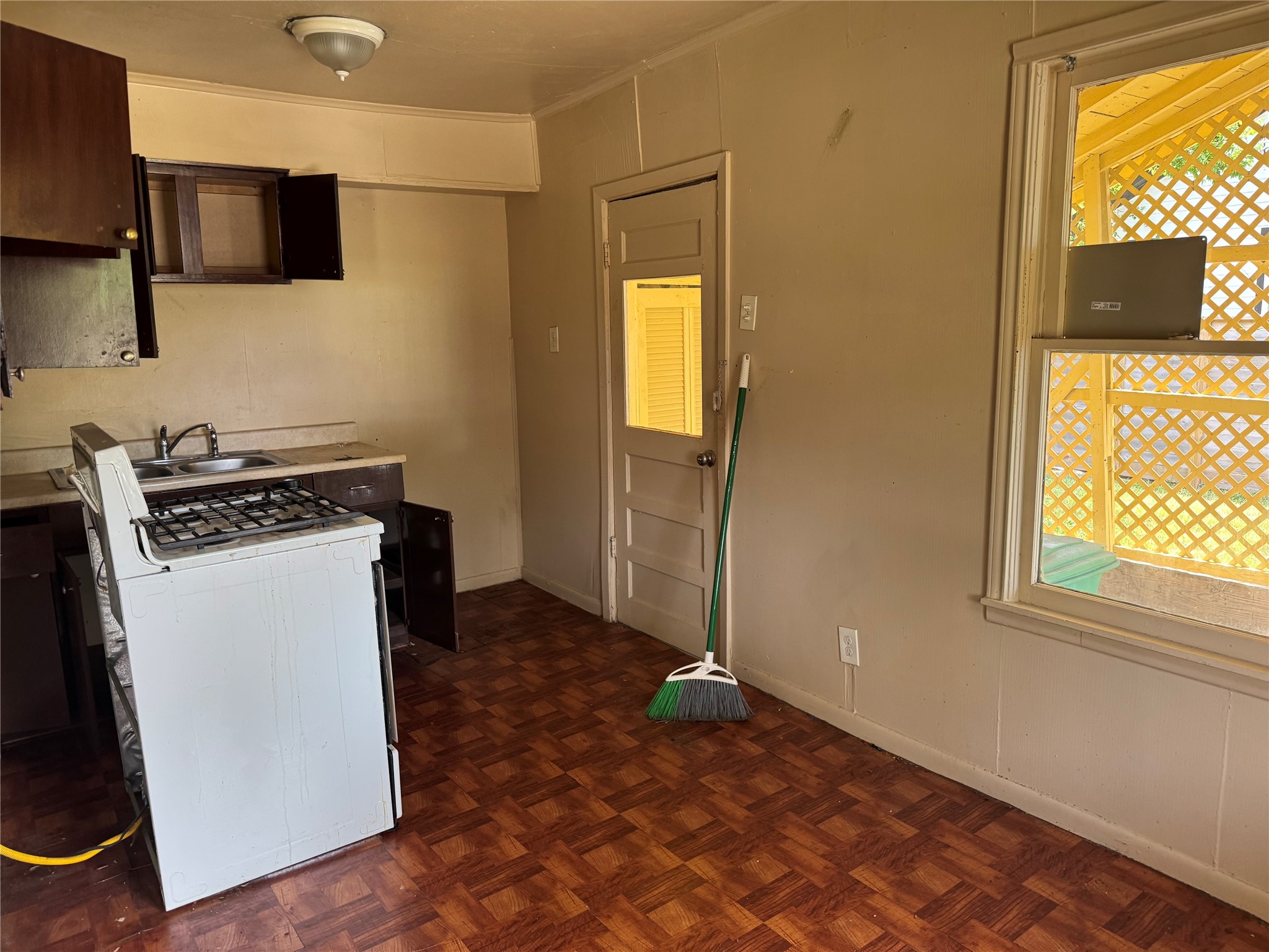 606 East 42nd Street Houston, TX 77022 - Photo 12 of 14 a view of a storage & utility room with a window