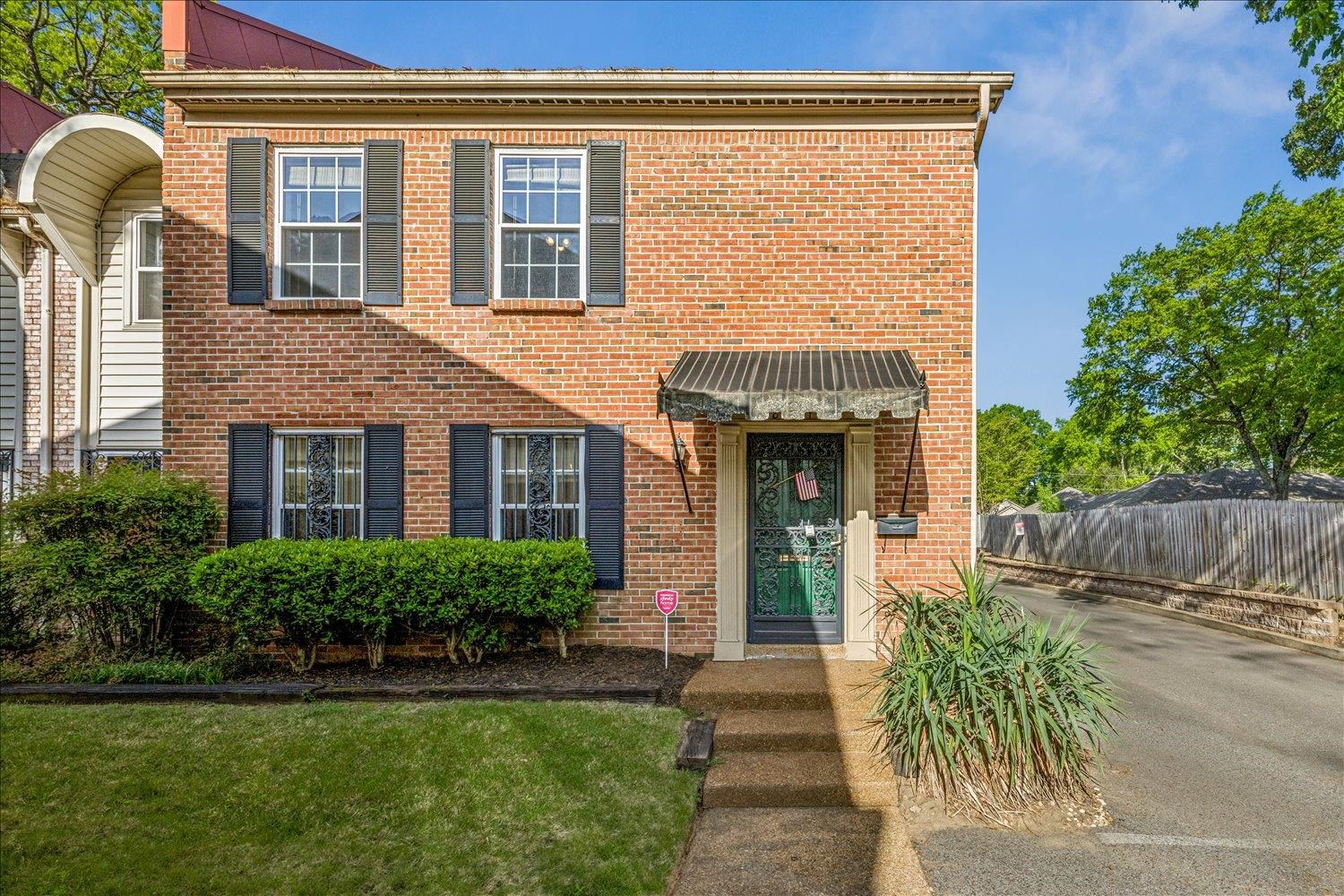 View of front facade with brick siding
