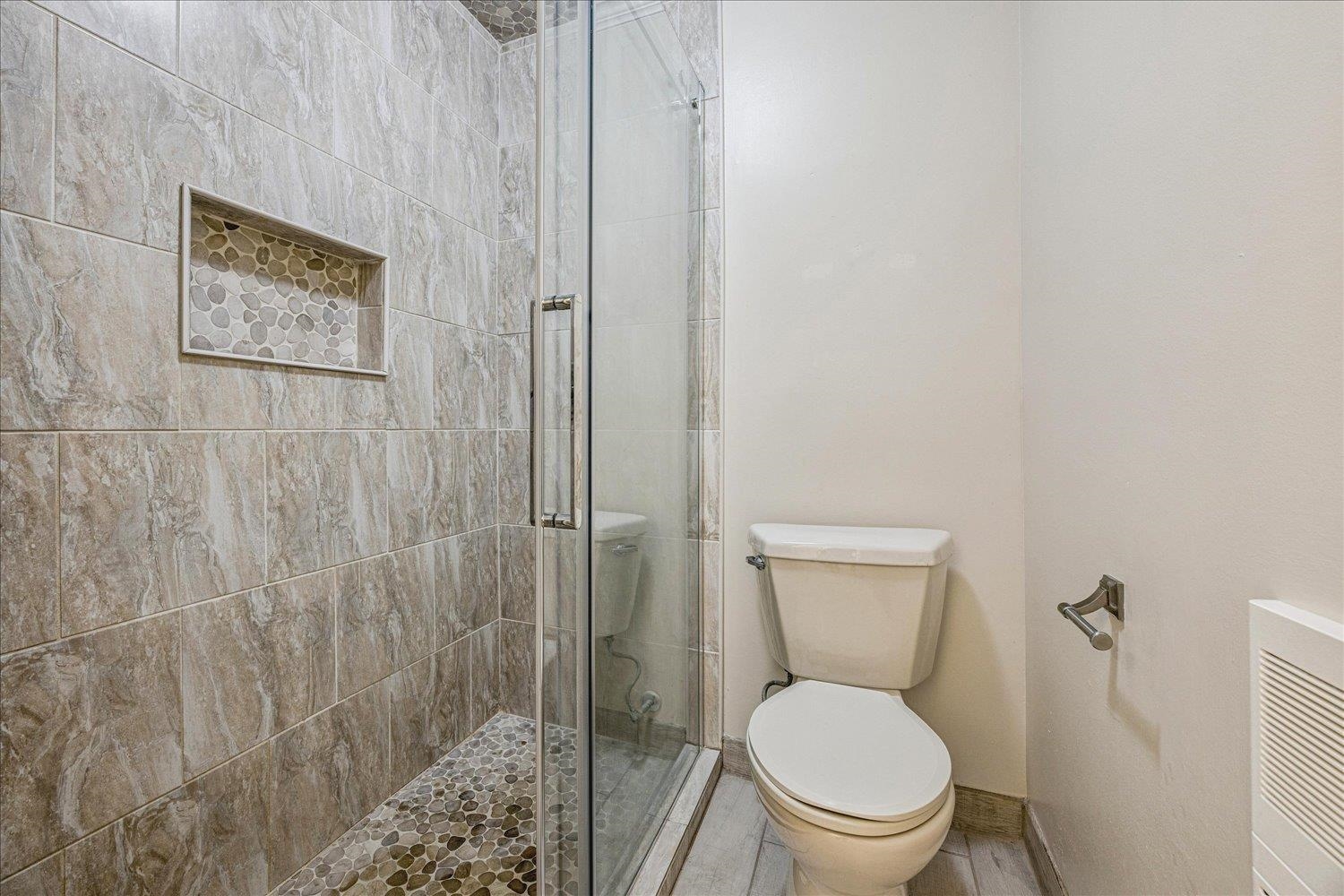 865 South Yates Road, Unit 1 Memphis, TN 38120 - Photo 13 of 25 Bathroom with toilet and a shower stall
