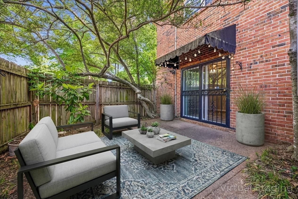 865 South Yates Road, Unit 1 Memphis, TN 38120 - Photo 14 of 25 Fenced backyard with a patio area and outdoor seating