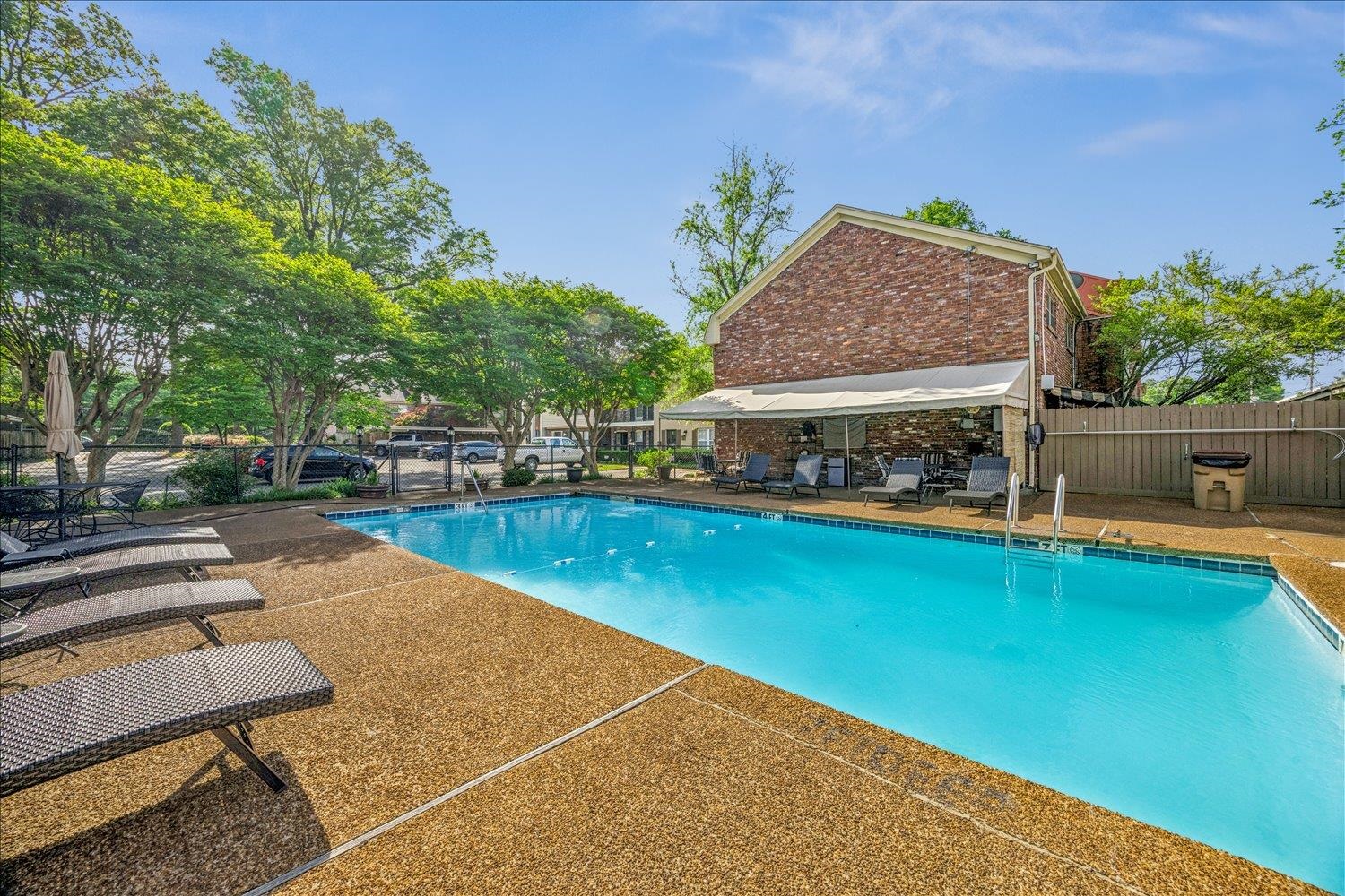 865 South Yates Road, Unit 1 Memphis, TN 38120 - Photo 23 of 25 Community pool featuring a patio