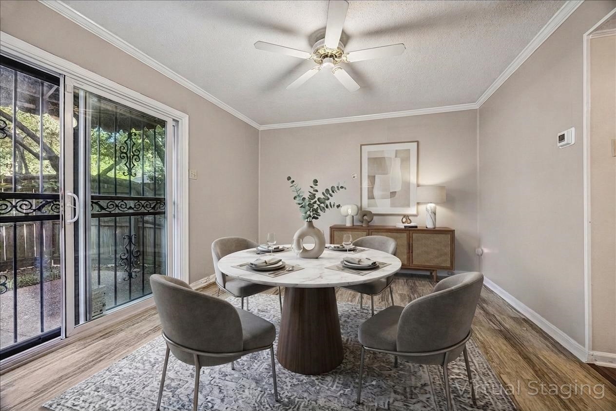 865 South Yates Road, Unit 1 Memphis, TN 38120 - Photo 7 of 25 Dining room featuring ornamental molding, ceiling fan, a textured ceiling, and wood finished floors