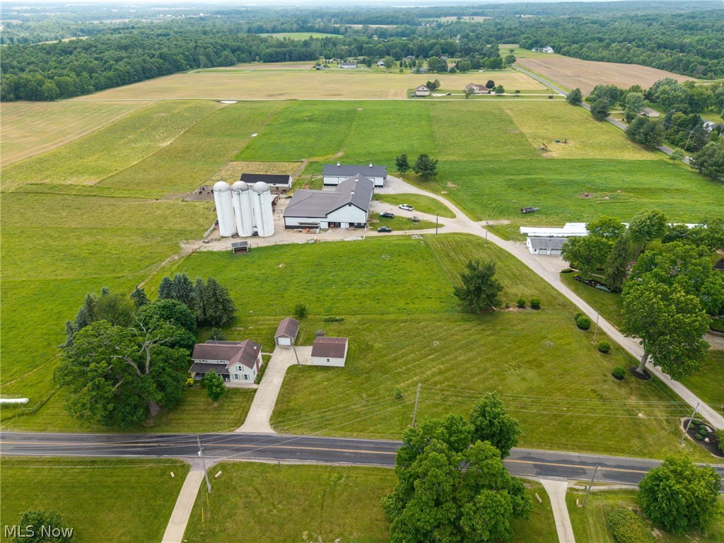 9626 Daniels Road Seville, OH 44273 - Photo 2 of 37 Aerial view showcasing expansive green fields and multiple structures