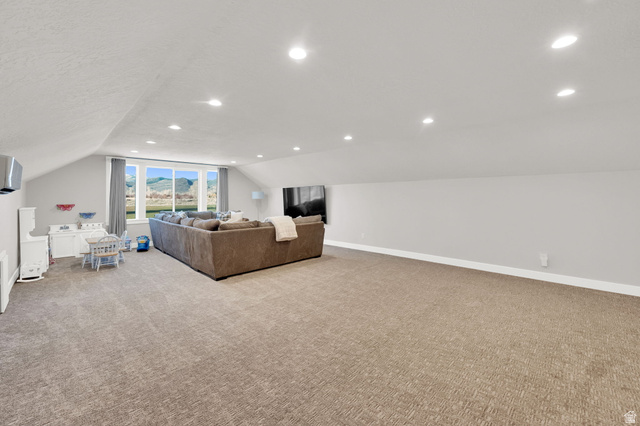 352 East Boulderville Road Oakley, UT 84055 - Photo 31 of 62 Living room with recessed lighting and light carpet