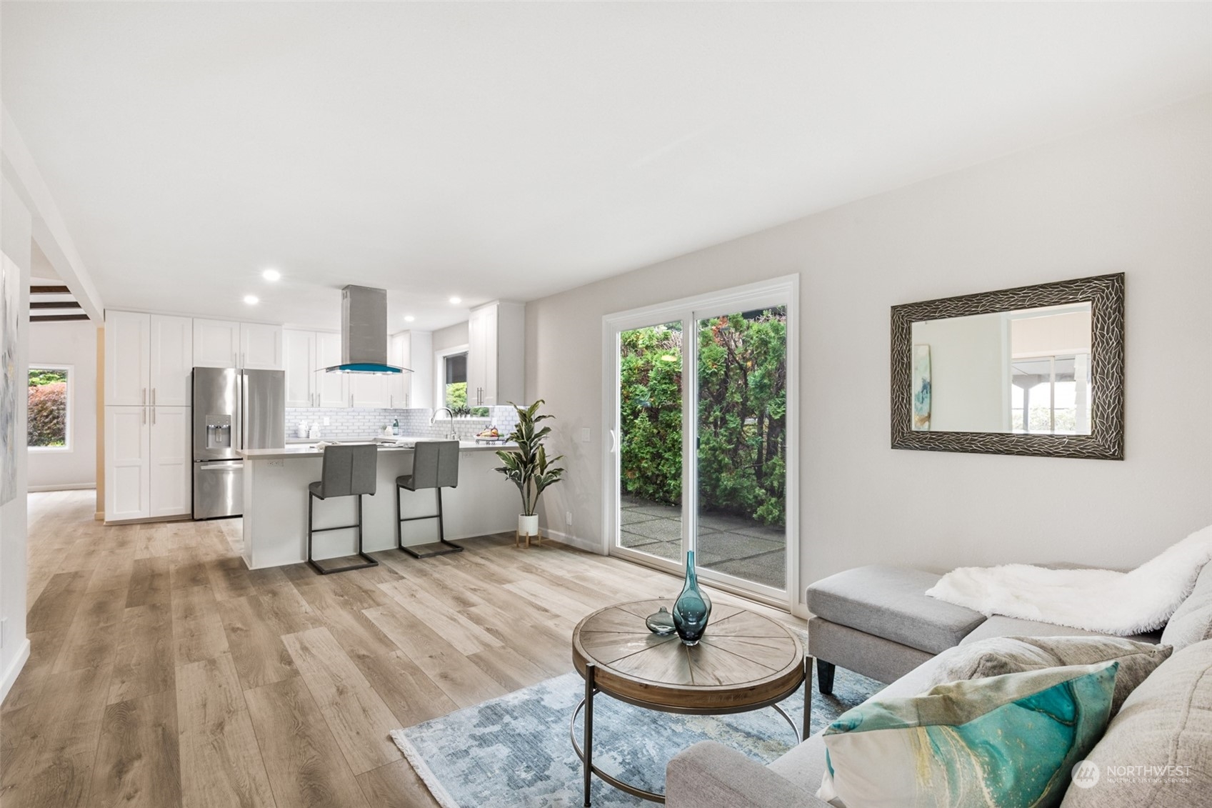 722 Wandering Creek Drive Bothell, WA 98021 - Photo 21 of 31 a living room with furniture and a table