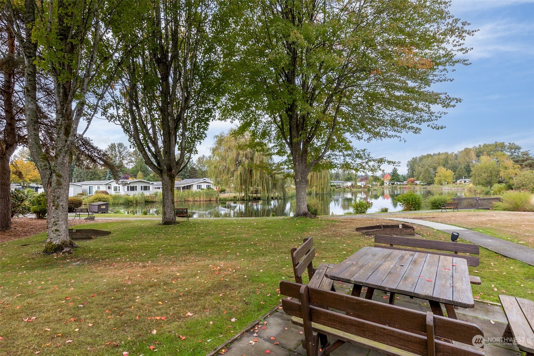 722 Wandering Creek Drive Bothell, WA 98021 - Photo 28 of 31 a view of a yard with swimming pool and trees