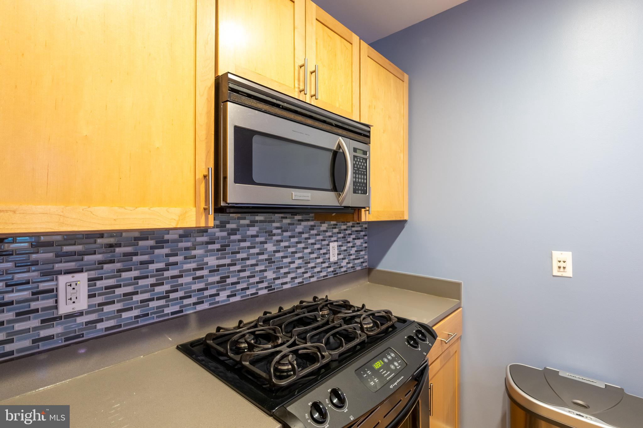 1123 6th Street Northwest, Unit 1 Washington, DC 20001 - Photo 14 of 19 a kitchen with stove and cabinets