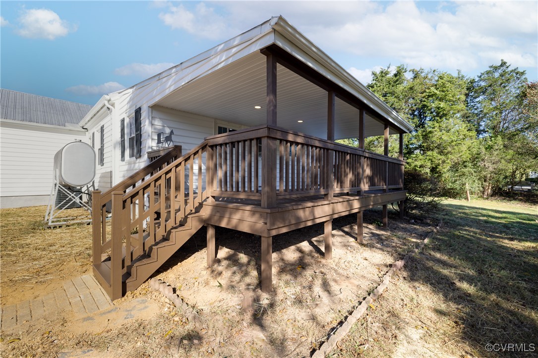 19503 Ahern Road Moseley, VA 23120 - Photo 27 of 29 a view of wooden house with a small yard
