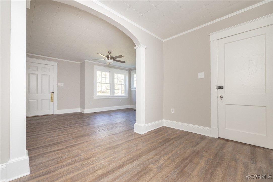 19503 Ahern Road Moseley, VA 23120 - Photo 10 of 29 an empty room with wooden floor and windows