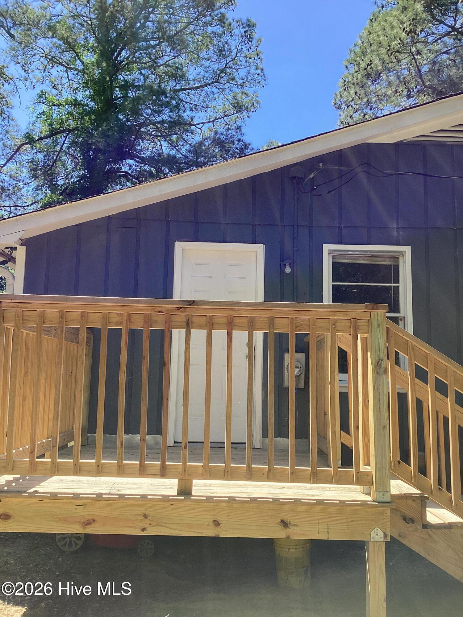 106 McArthur Drive Rockingham, NC 28379 - Photo 18 of 21 New deck leads to kitchen entrance