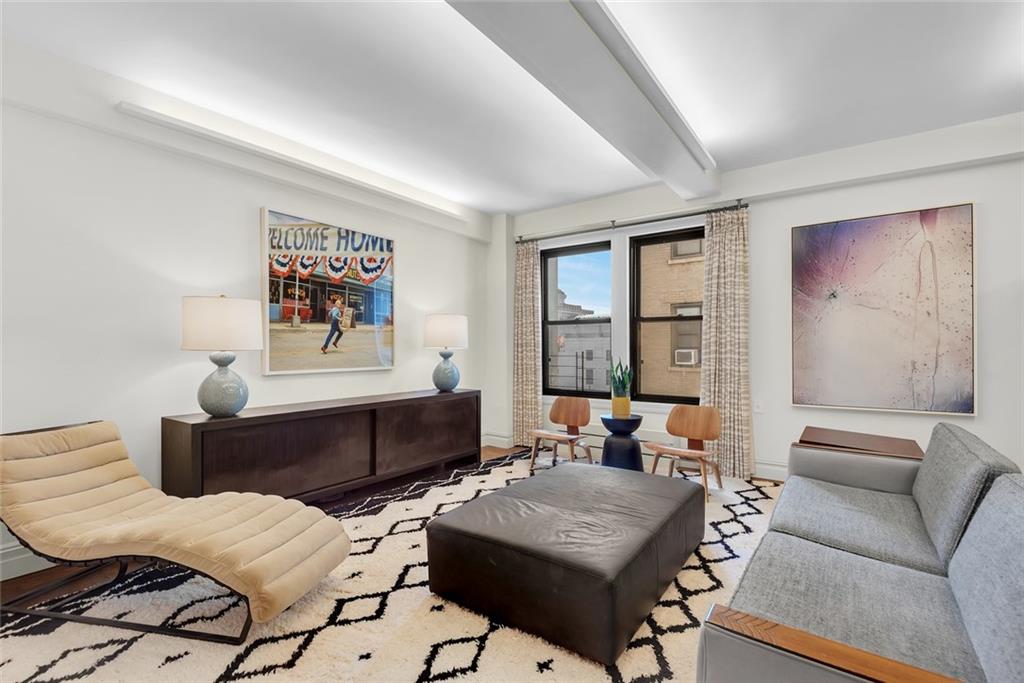 135 Eastern Parkway, Unit 7E Brooklyn, NY 11238 - Photo 6 of 17 a living room with furniture and a window