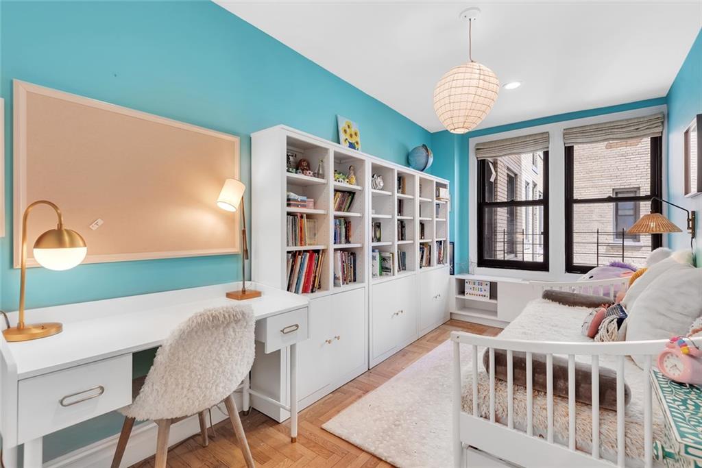 135 Eastern Parkway, Unit 7E Brooklyn, NY 11238 - Photo 10 of 17 a living room with furniture and a window