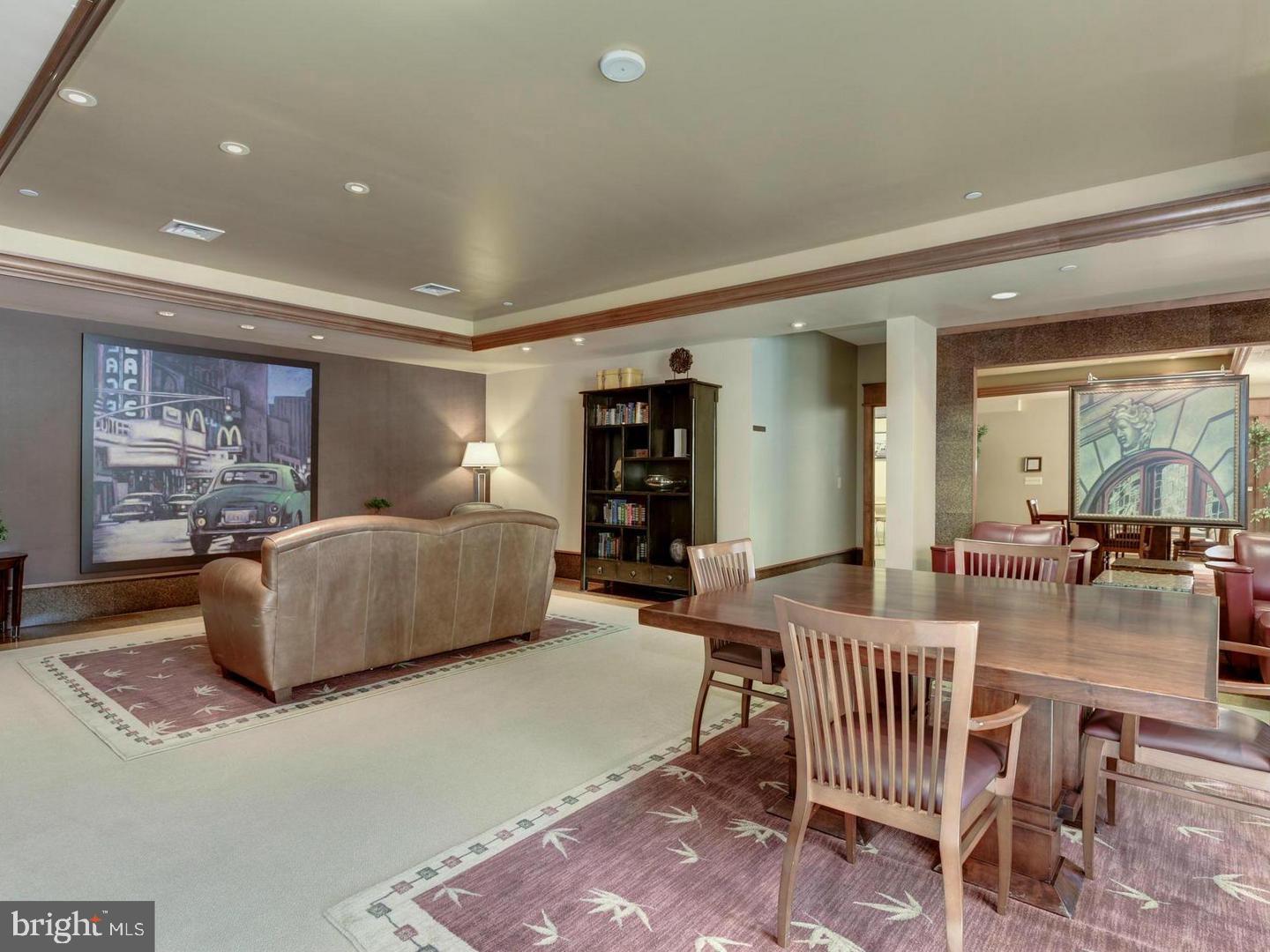 11800 Sunset Hills Road, Unit 314 Reston, VA 20190 - Photo 33 of 50 a living room with furniture and wooden floor