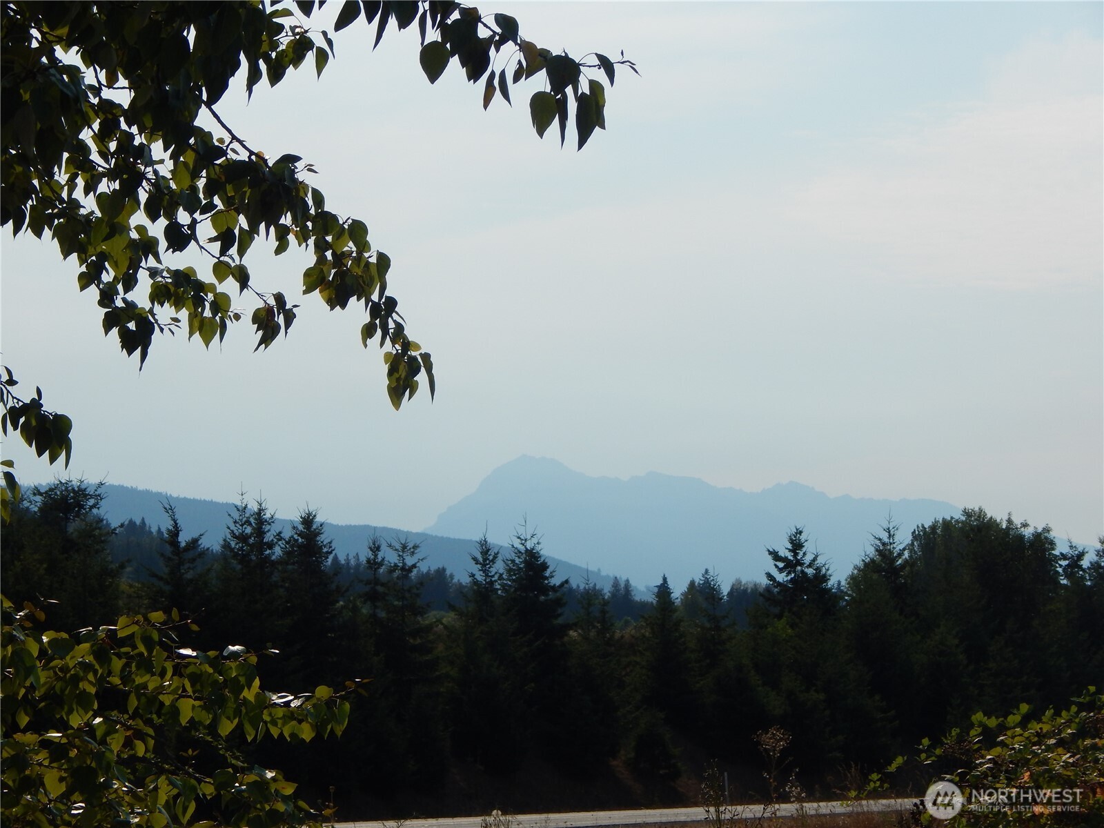 872 South Still Road Sequim, WA 98382 - Photo 7 of 10 a view of a house with a park