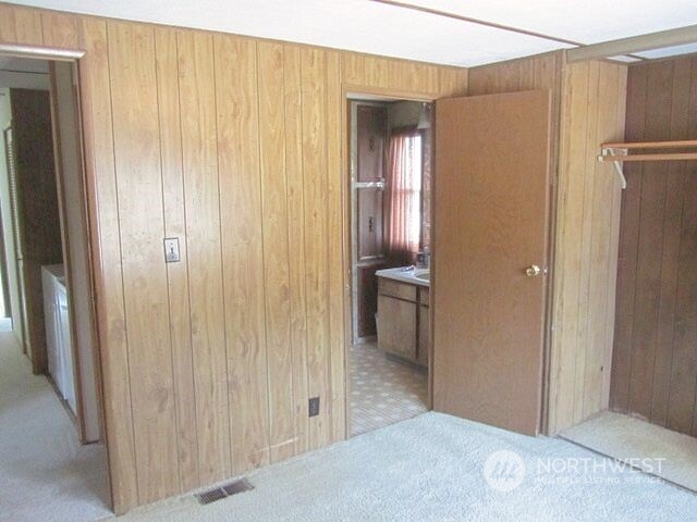 309 North Main Street Riverside, WA 98849 - Photo 12 of 31 a view of a hallway with wooden walls