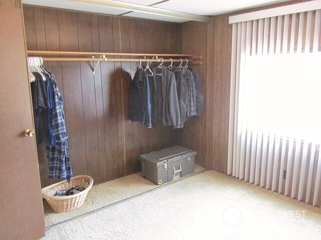 309 North Main Street Riverside, WA 98849 - Photo 13 of 31 a view of walk in closet with clothes and shoes
