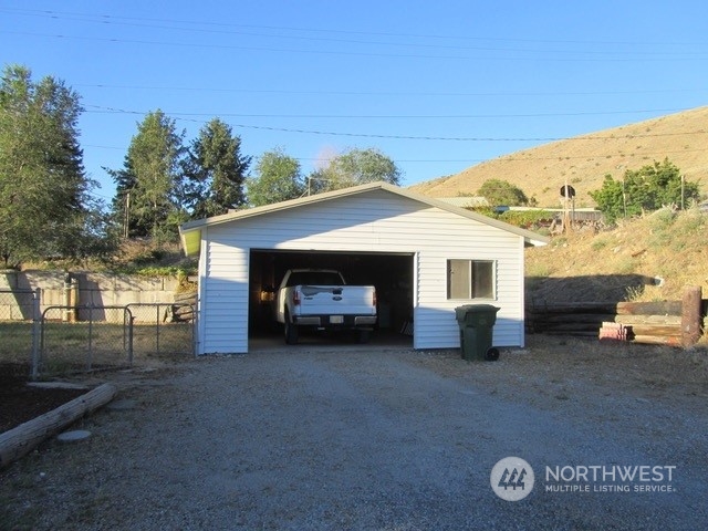 309 North Main Street Riverside, WA 98849 - Photo 17 of 31 a view of a house with a yard