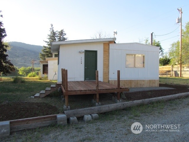 309 North Main Street Riverside, WA 98849 - Photo 24 of 31 a view of a house with a yard