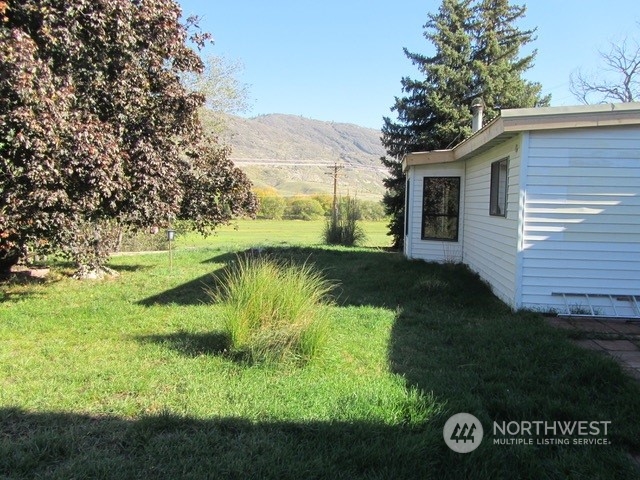 309 North Main Street Riverside, WA 98849 - Photo 26 of 31 a view of a backyard with plants and a garden